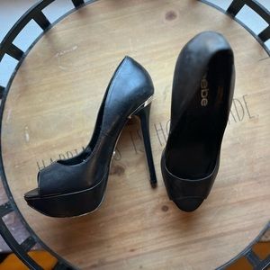 Women’s black Bebe heels. Like new.